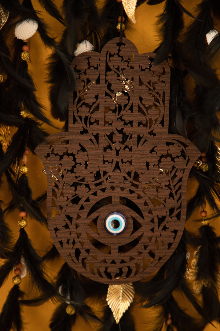 Protective hamsa.
