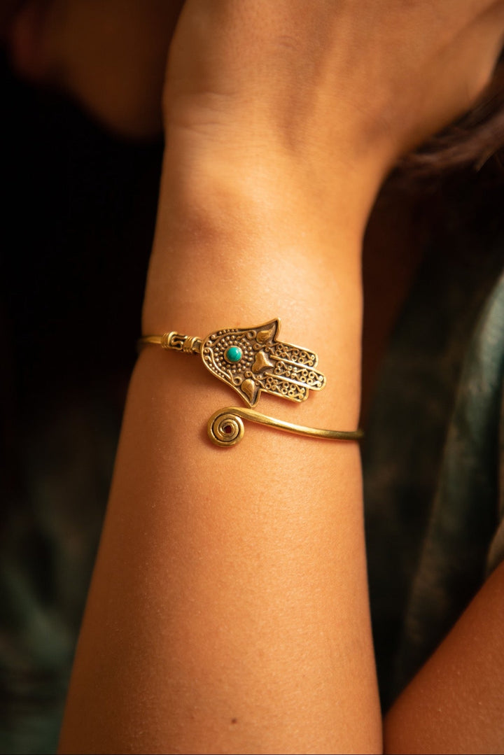 Hamsa hand cuff with turquoise stone